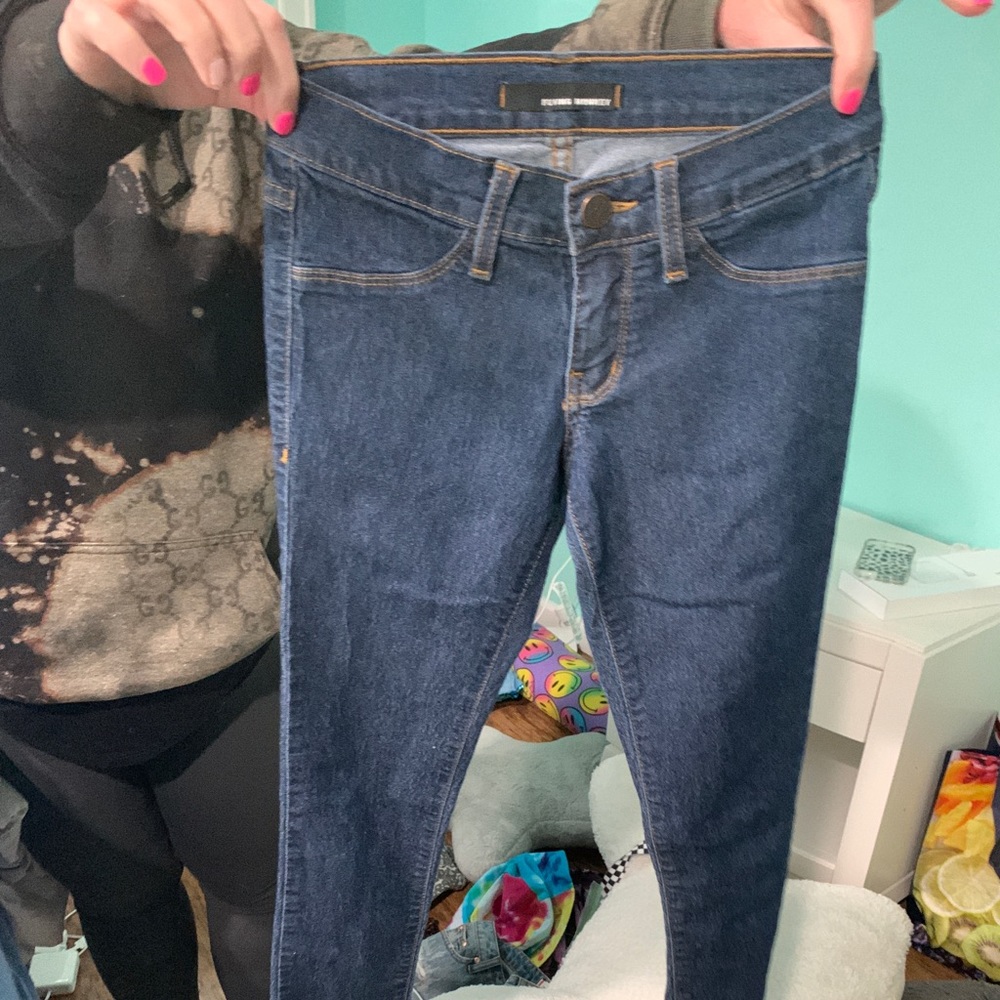 two pairs of flying monkey jeans